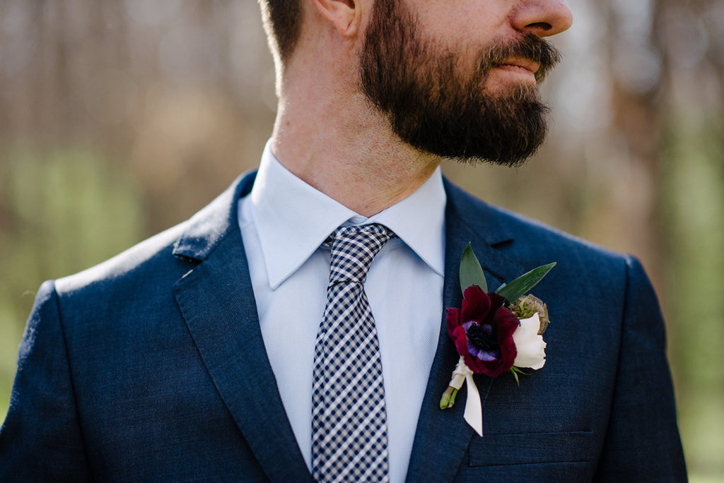 groom with boutonniere 